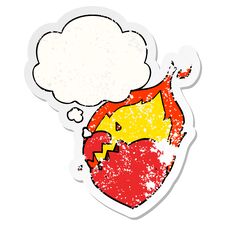 Cartoon Flaming Heart And Thought Bubble As A Distressed Worn Sticker Royalty Free Stock Photos