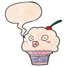Funny Cartoon Cupcake And Speech Bubble In Retro Texture Style Stock Photography