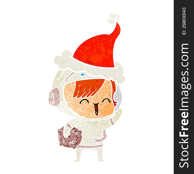 hand drawn retro cartoon of a happy spacegirl holding moon rock wearing santa hat