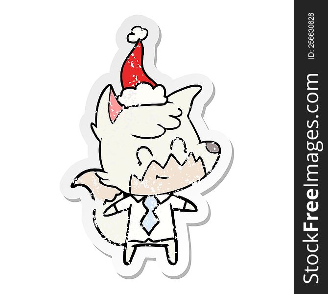 Distressed Sticker Cartoon Of A Friendly Fox Wearing Santa Hat
