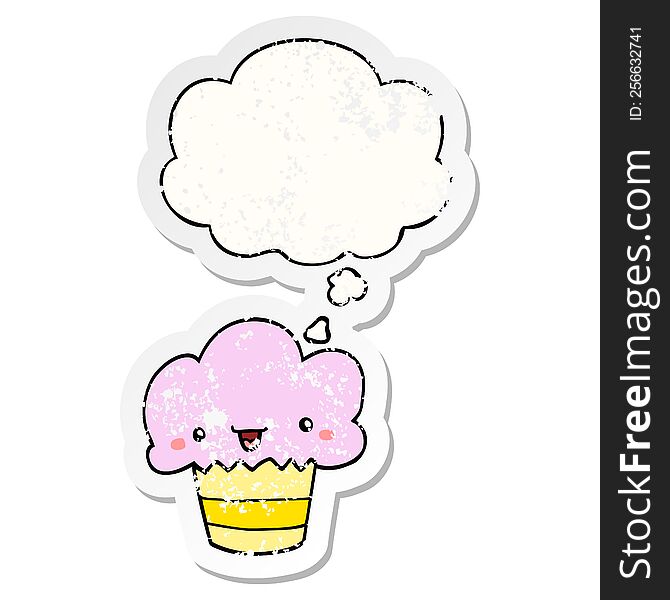 cartoon cupcake with face with thought bubble as a distressed worn sticker