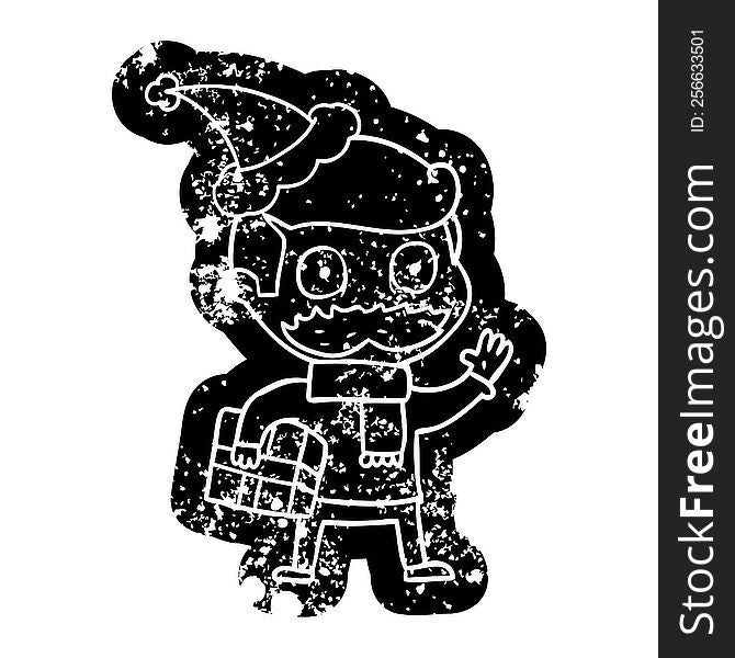 quirky cartoon distressed icon of a man with mustache and christmas present wearing santa hat
