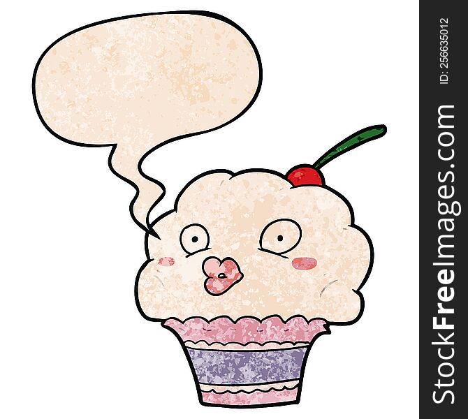 funny cartoon cupcake with speech bubble in retro texture style