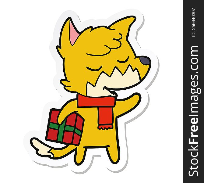 Sticker Of A Friendly Cartoon Fox With Christmas Present