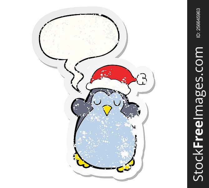 cute christmas penguin with speech bubble distressed distressed old sticker. cute christmas penguin with speech bubble distressed distressed old sticker