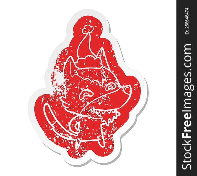 Cartoon Distressed Sticker Of A Hungry Wolf Wearing Santa Hat