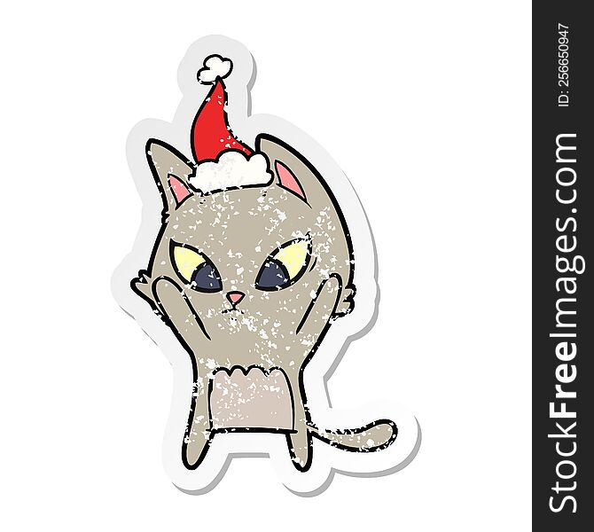 Confused Distressed Sticker Cartoon Of A Cat Wearing Santa Hat