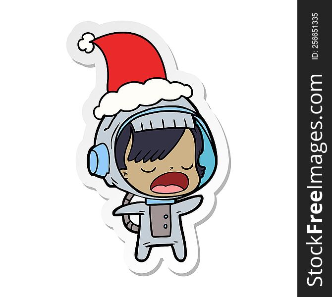 Sticker Cartoon Of A Talking Astronaut Woman Wearing Santa Hat