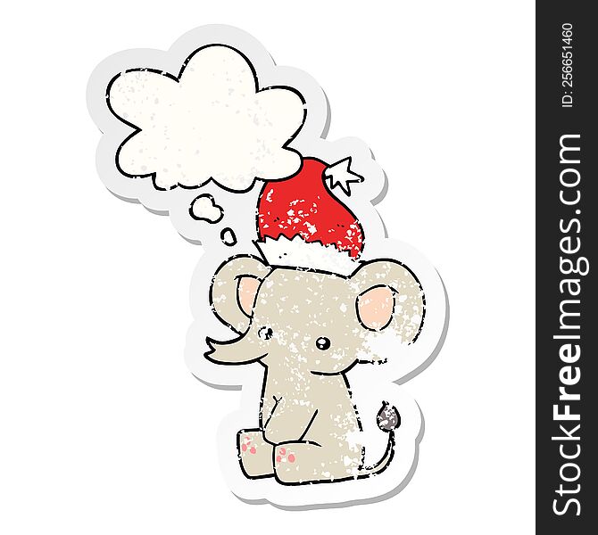 cute christmas elephant with thought bubble as a distressed worn sticker