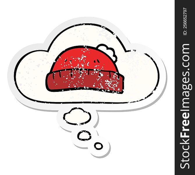 cartoon woolly hat with thought bubble as a distressed worn sticker
