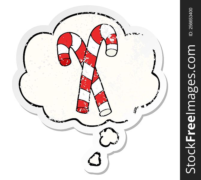 cartoon candy canes with thought bubble as a distressed worn sticker
