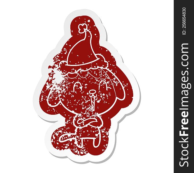 Cute Cartoon Distressed Sticker Of A Dog Wearing Santa Hat