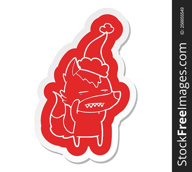 Cartoon  Sticker Of A Wolf Showing Teeth Wearing Santa Hat