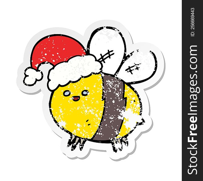 Distressed Sticker Of A Cute Cartoon Bee Wearing Christmas Hat