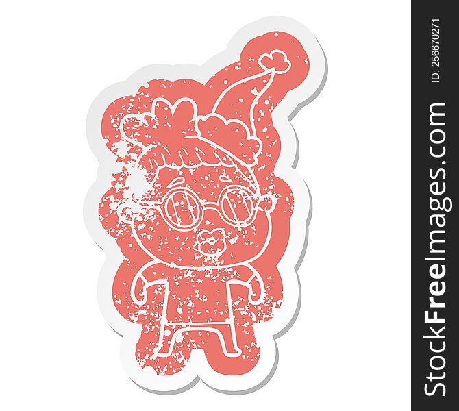 cartoon distressed sticker of a woman wearing spectacles wearing santa hat