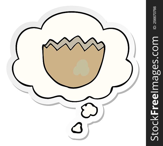 cartoon cracked eggshell with thought bubble as a printed sticker