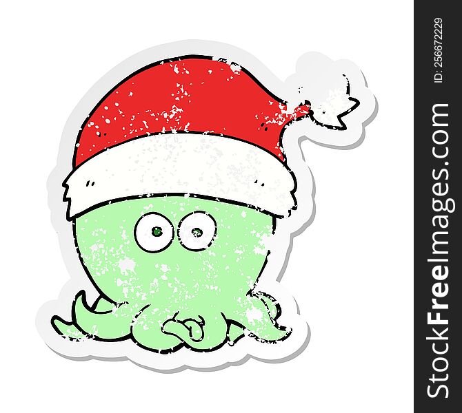 Distressed Sticker Of A Cartoon Octopus Wearing Christmas Hat