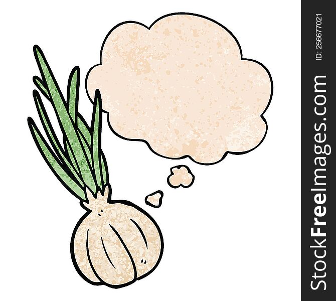 cartoon garlic with thought bubble in grunge texture style. cartoon garlic with thought bubble in grunge texture style