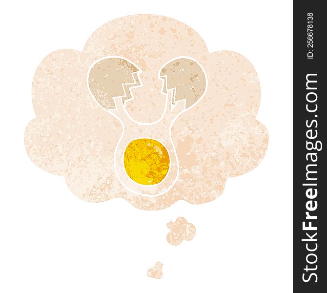 cartoon cracked egg with thought bubble in grunge distressed retro textured style. cartoon cracked egg with thought bubble in grunge distressed retro textured style