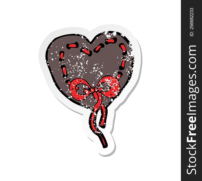 retro distressed sticker of a stitched heart cartoon