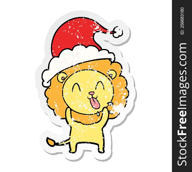 Happy Distressed Sticker Cartoon Of A Lion Wearing Santa Hat