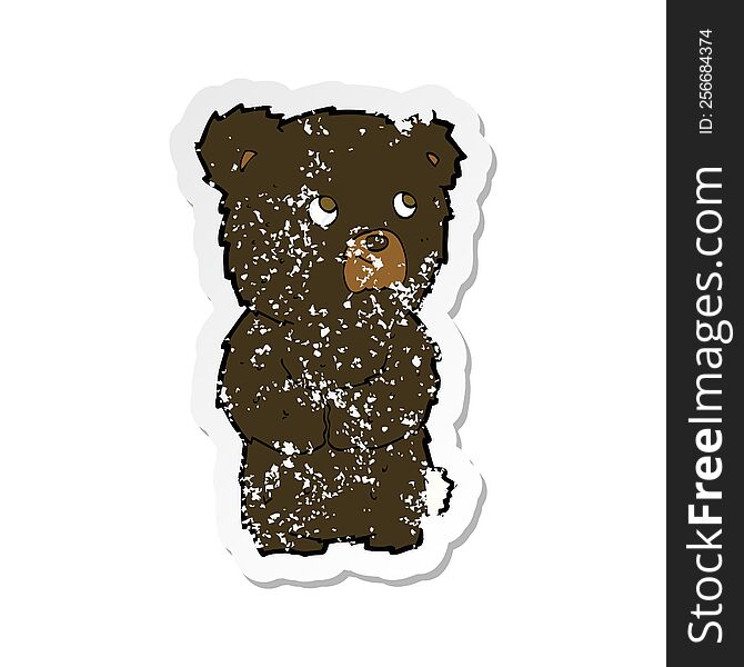Retro Distressed Sticker Of A Cartoon Black Bear Cub