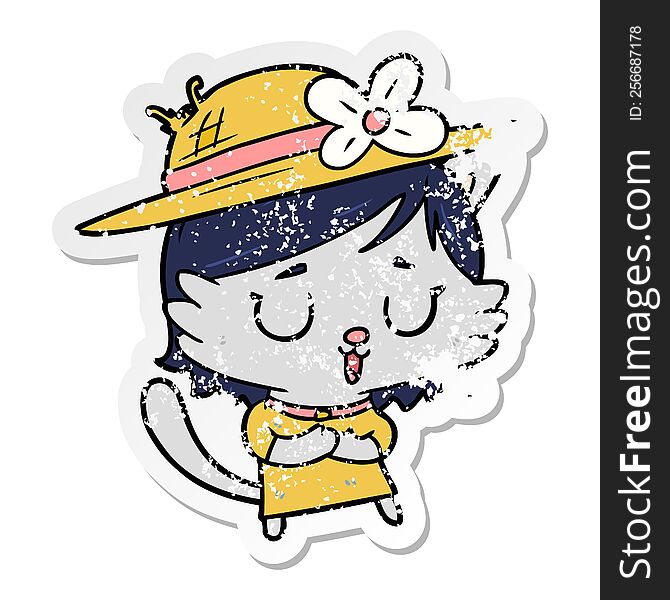 distressed sticker of a cartoon cat wearing hat