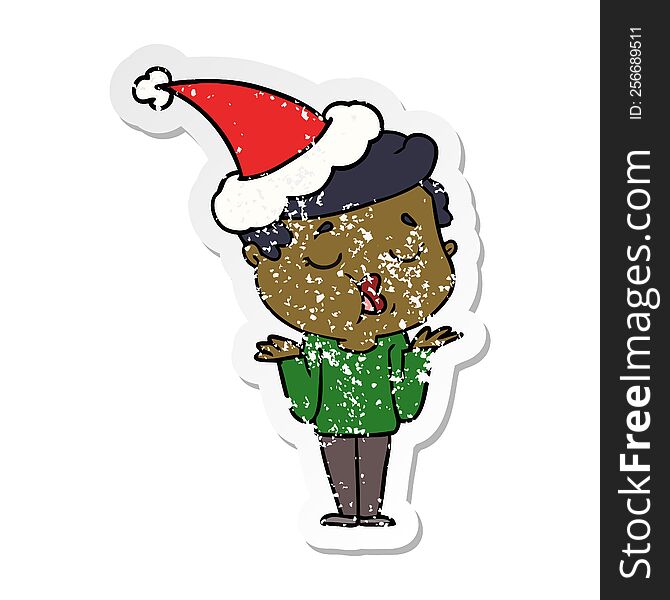 hand drawn distressed sticker cartoon of a man talking and shrugging shoulders wearing santa hat