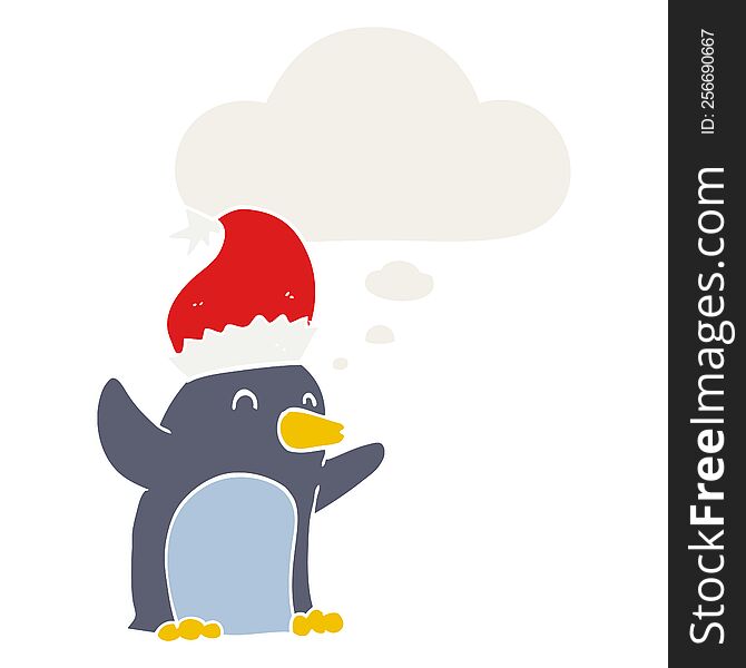 cute cartoon christmas penguin and thought bubble in retro style