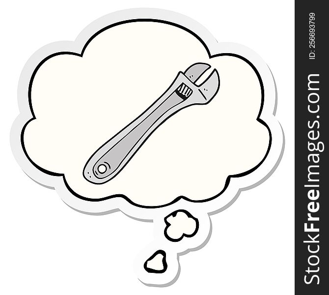 cartoon spanner with thought bubble as a printed sticker