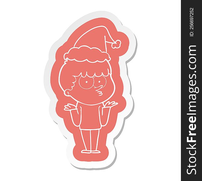 quirky cartoon  sticker of a curious boy shrugging shoulders wearing santa hat