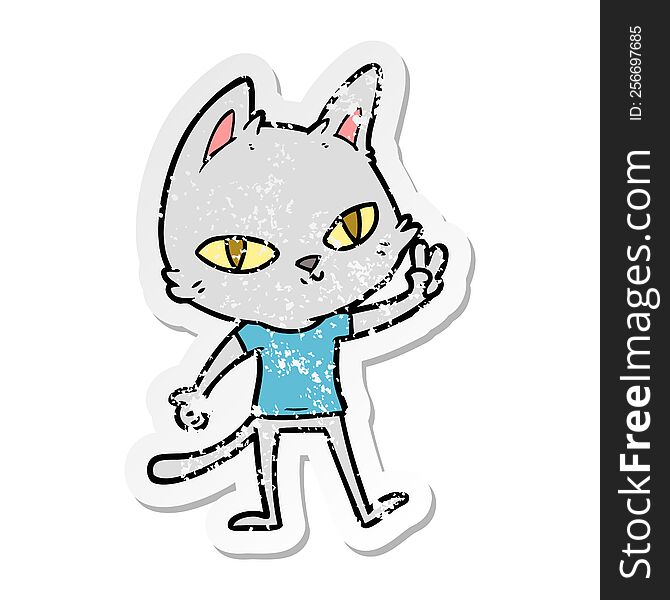 distressed sticker of a cartoon cat waving