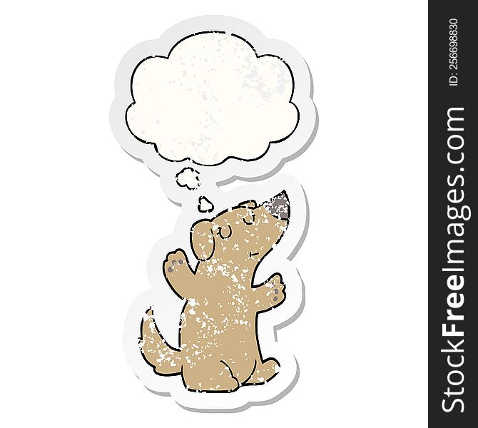 cartoon dog with thought bubble as a distressed worn sticker