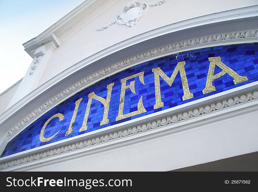 Beautiful mosaic cinema sign in tiles on local picture house. Beautiful mosaic cinema sign in tiles on local picture house