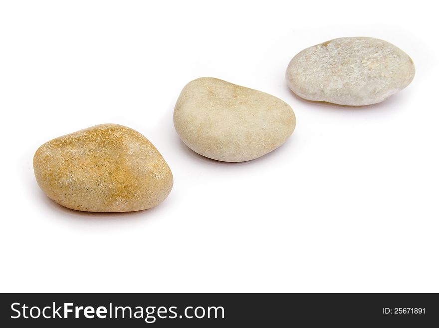 Beautiful natural tones on this trio of pebbles from Chesil beach. Beautiful natural tones on this trio of pebbles from Chesil beach