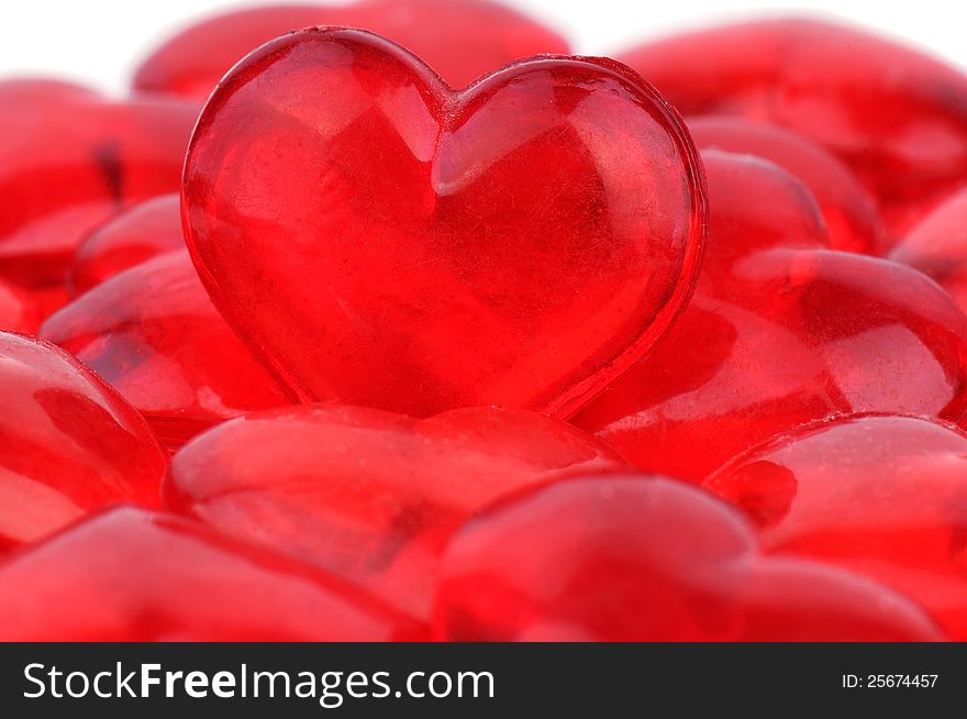 Large plastic red heart on background from hearts