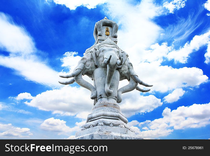 Erawan stone on bluesky, Stucco erawan puppet