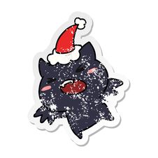 Christmas Distressed Sticker Cartoon Of Kawaii Bat Stock Photo