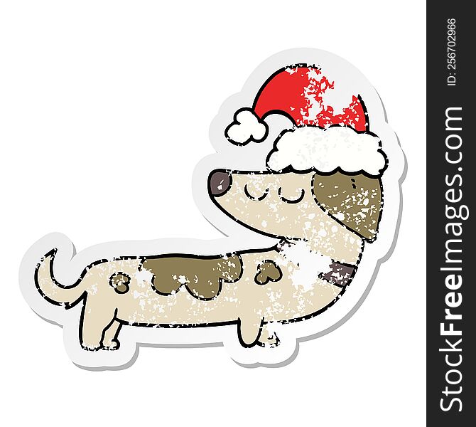 Distressed Sticker Of A Cartoon Dog Wearing Christmas Hat