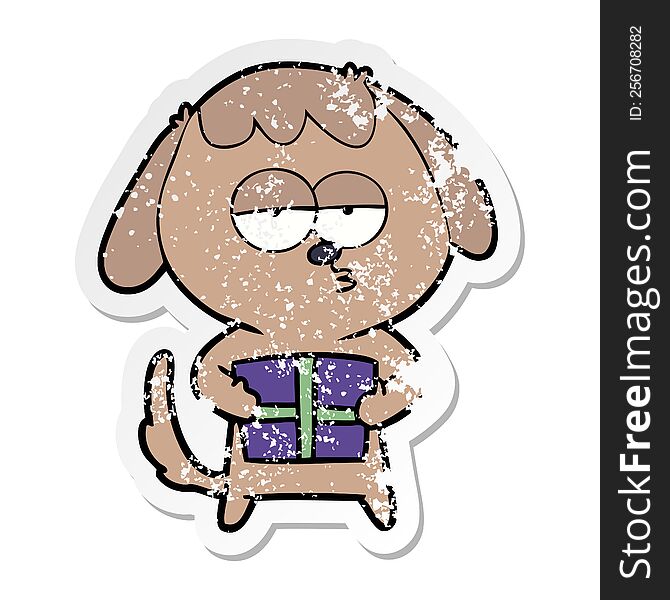 Distressed Sticker Of A Cartoon Bored Dog With Christmas Present