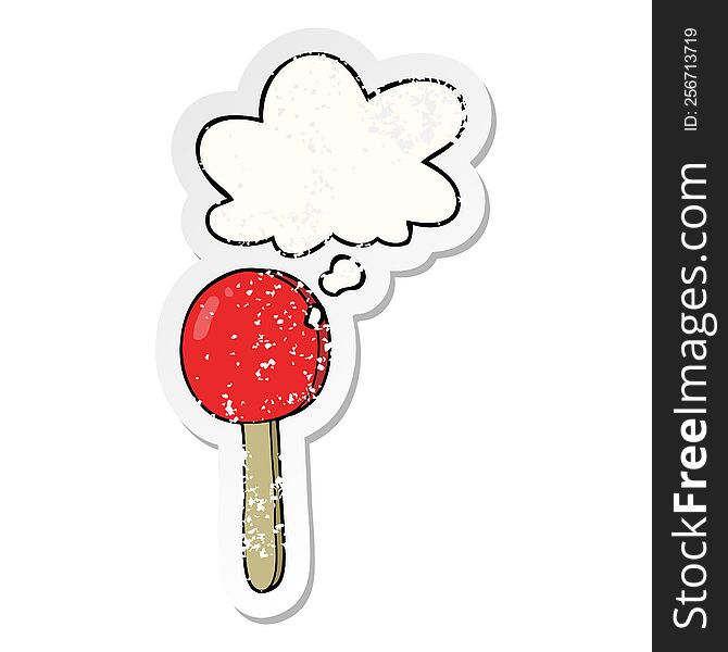 cartoon lollipop with thought bubble as a distressed worn sticker