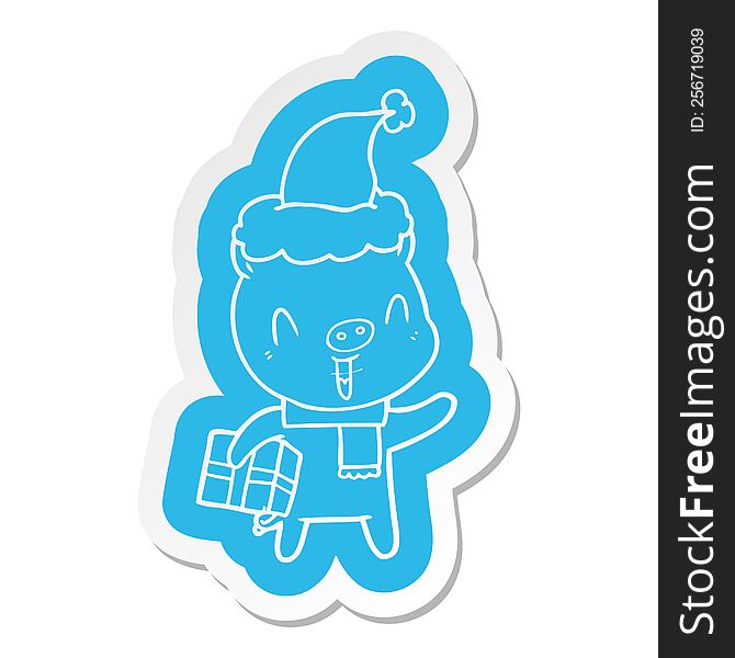 Happy Cartoon  Sticker Of A Pig With Xmas Present Wearing Santa Hat
