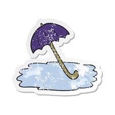 Retro Distressed Sticker Of A Cartoon Wet Umbrella Royalty Free Stock Images