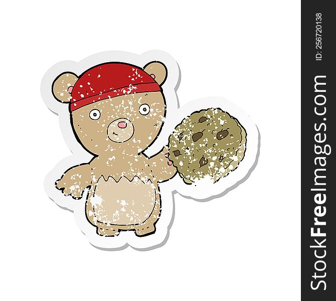 retro distressed sticker of a cartoon teddy bear with cookie