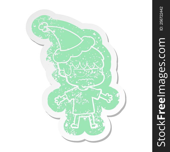 annoyed quirky cartoon distressed sticker of a boy wearing santa hat