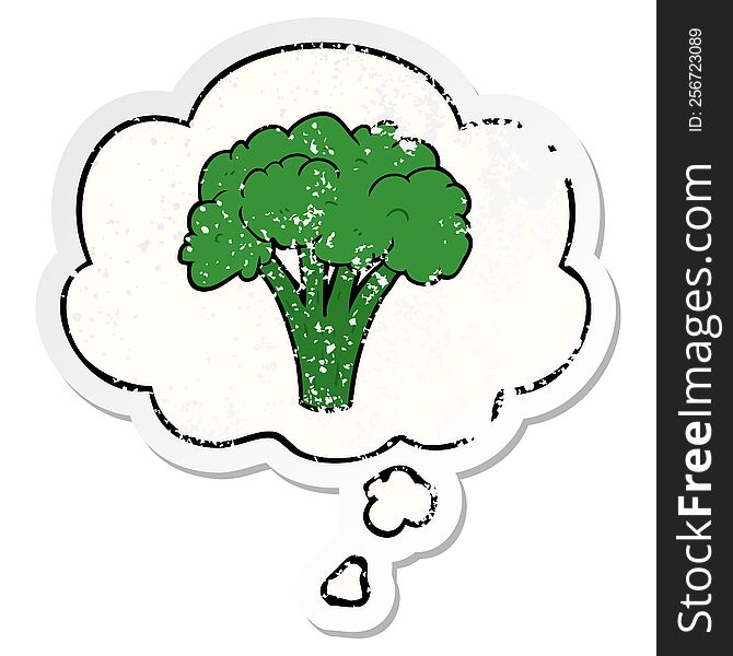 cartoon brocoli with thought bubble as a distressed worn sticker