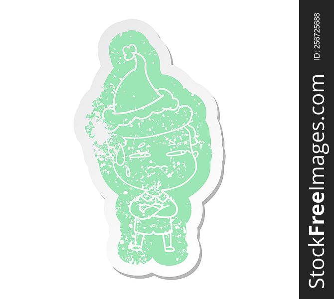 quirky cartoon distressed sticker of a anxious man wearing santa hat