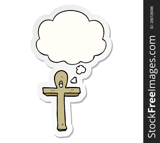 cartoon ankh symbol with thought bubble as a printed sticker