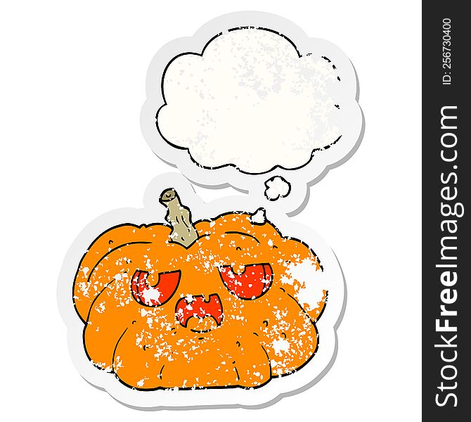 cartoon pumpkin and thought bubble as a distressed worn sticker