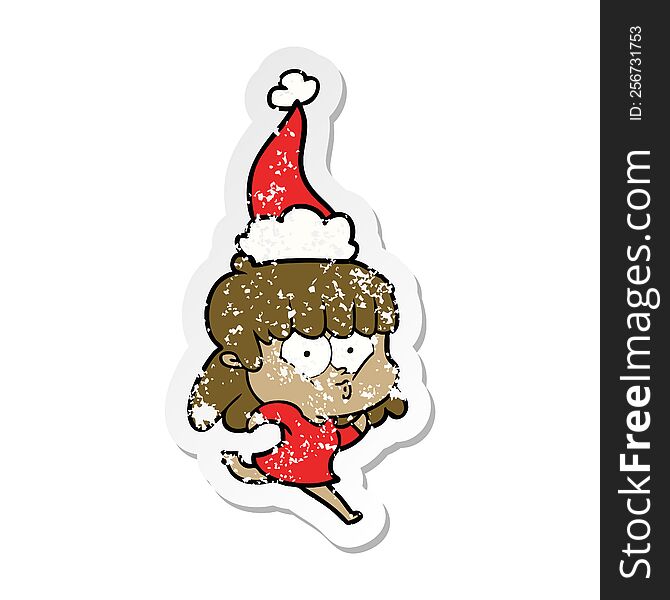 Distressed Sticker Cartoon Of A Whistling Girl Wearing Santa Hat